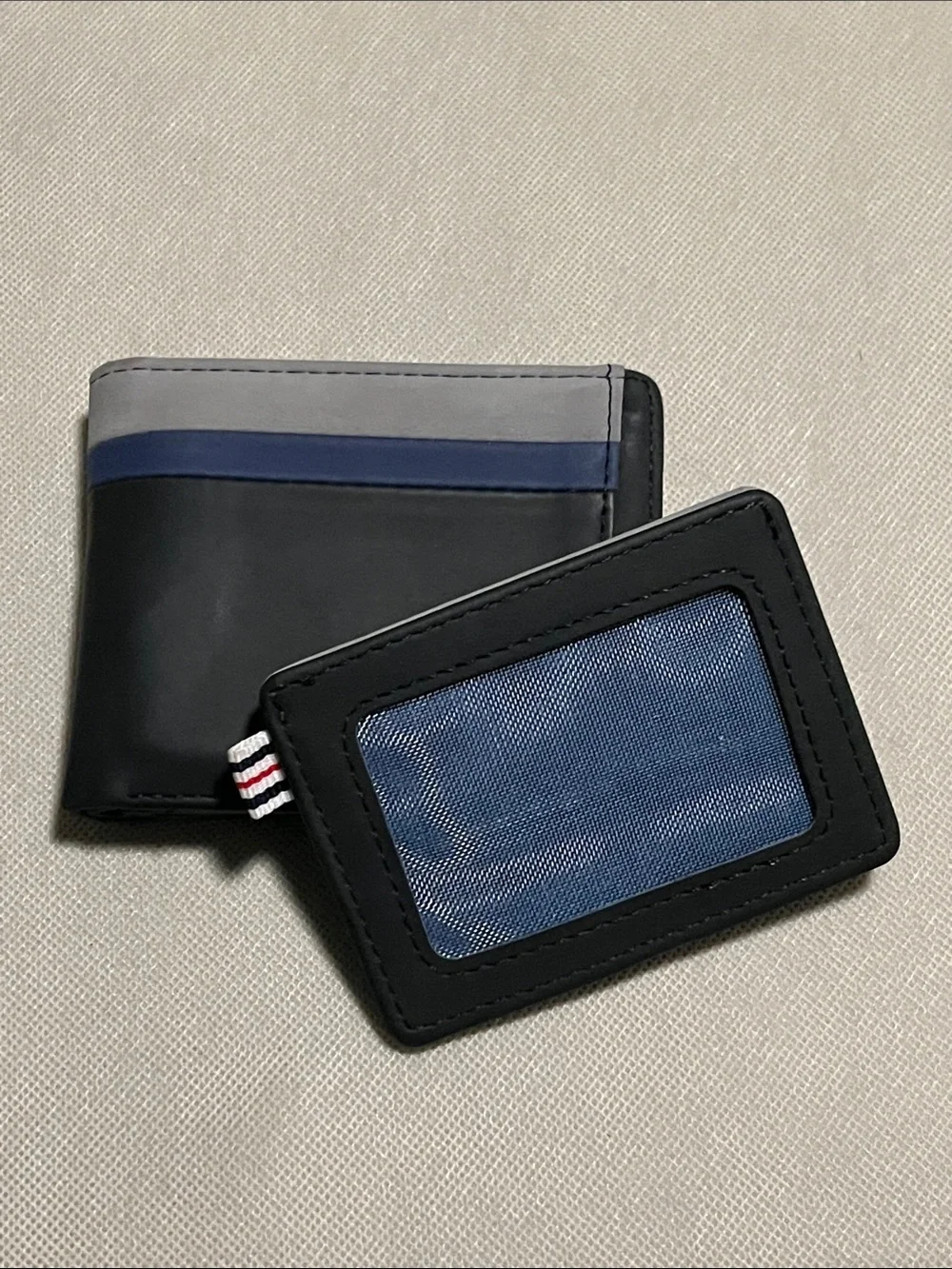 FILA Men's Colorblock Bifold Wallet with a Removable Passcase/Card Holder.